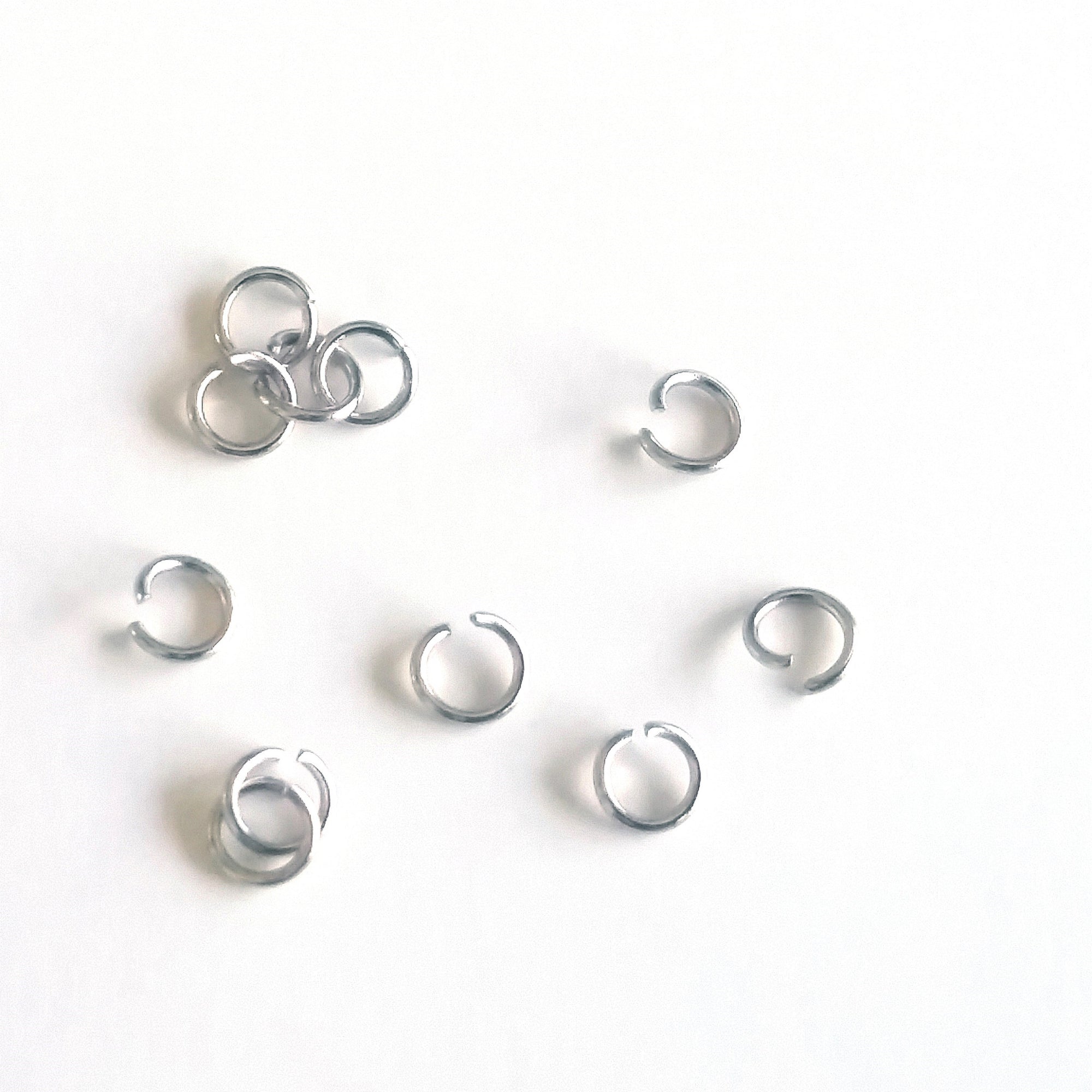 Sterling Silver Jump Rings x 10. 1mm Thick / 18 gauge. Inside 5mm. Outside  7mm.