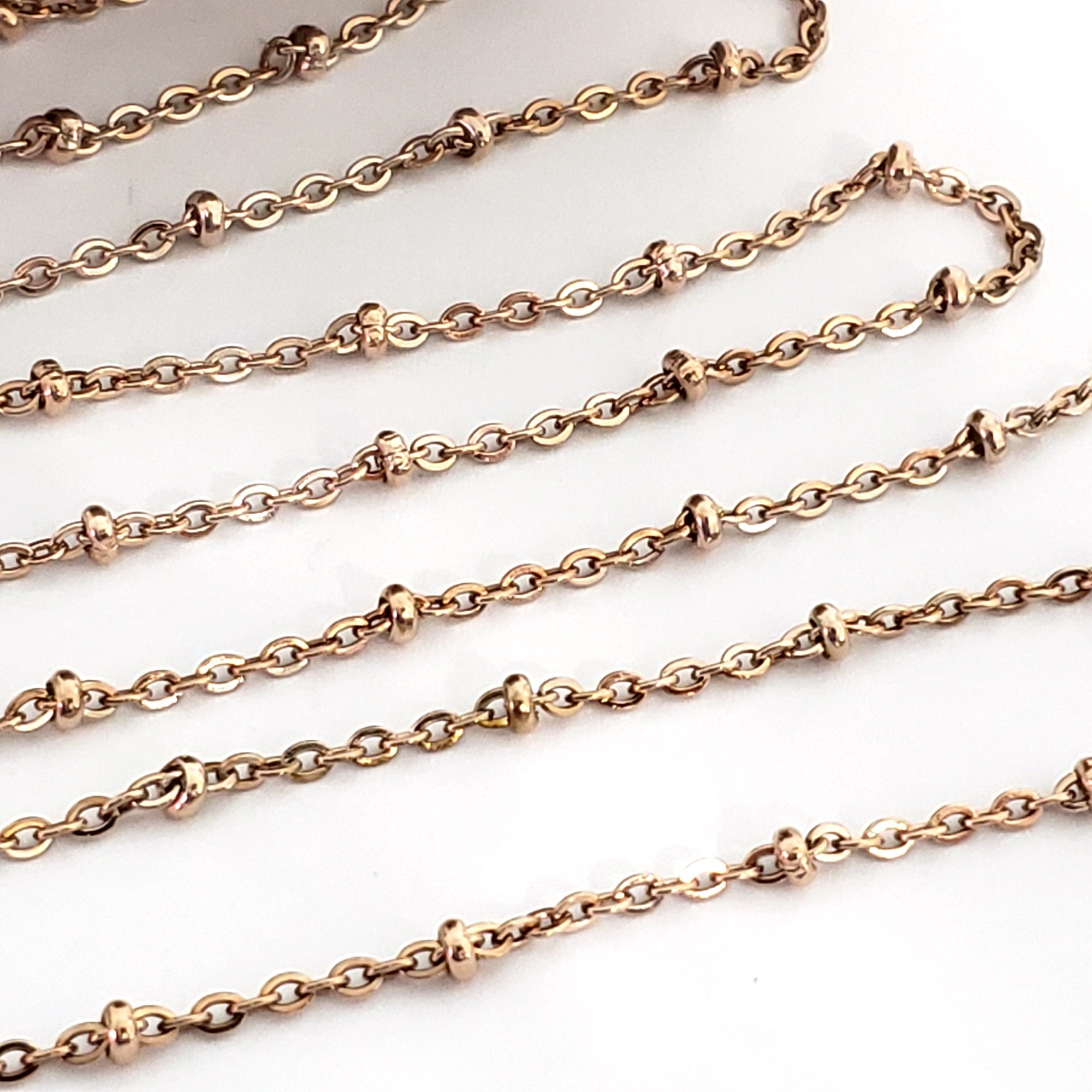 Rose Gold Station Chain, Stainless Steel, 3x2mm Rondelle Stations, Soldered Closed Links, Lot Size 50 Meters, #1937 RG Spool