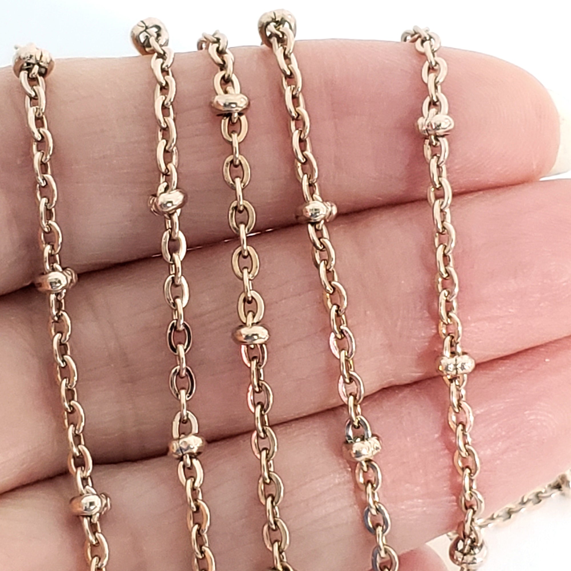 Rose Gold Station Chain, Stainless Steel, 3x2mm Rondelle Stations, Soldered Closed Links, Lot Size 50 Meters, #1937 RG Spool